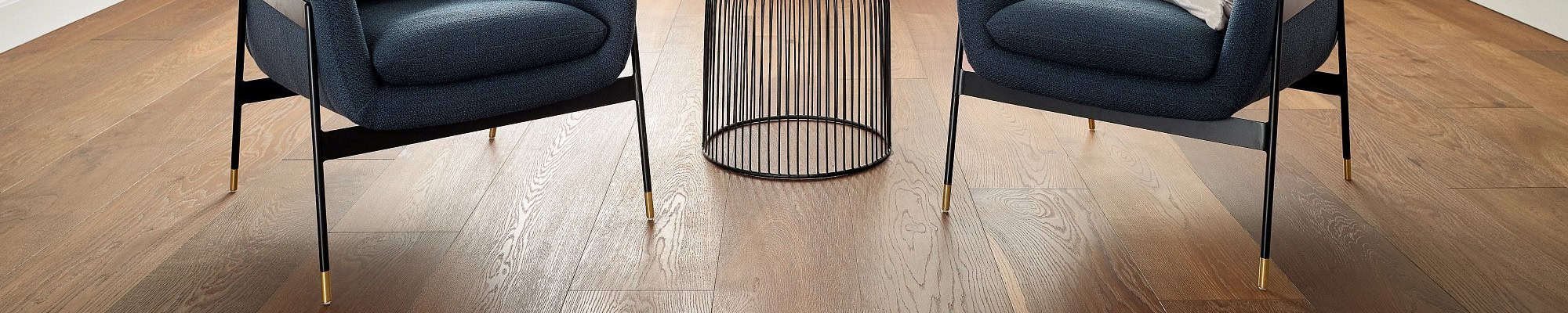 two chairs on hardwood floor - Promotions in Auburn, IN